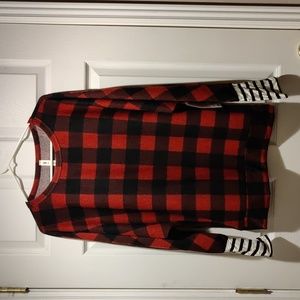 Buffalo plaid dolman sleeve top with thumb holes.